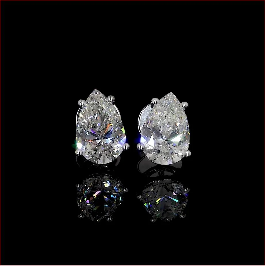 1 Cts 18k White Gold Pear Shape Studs Earring - Video