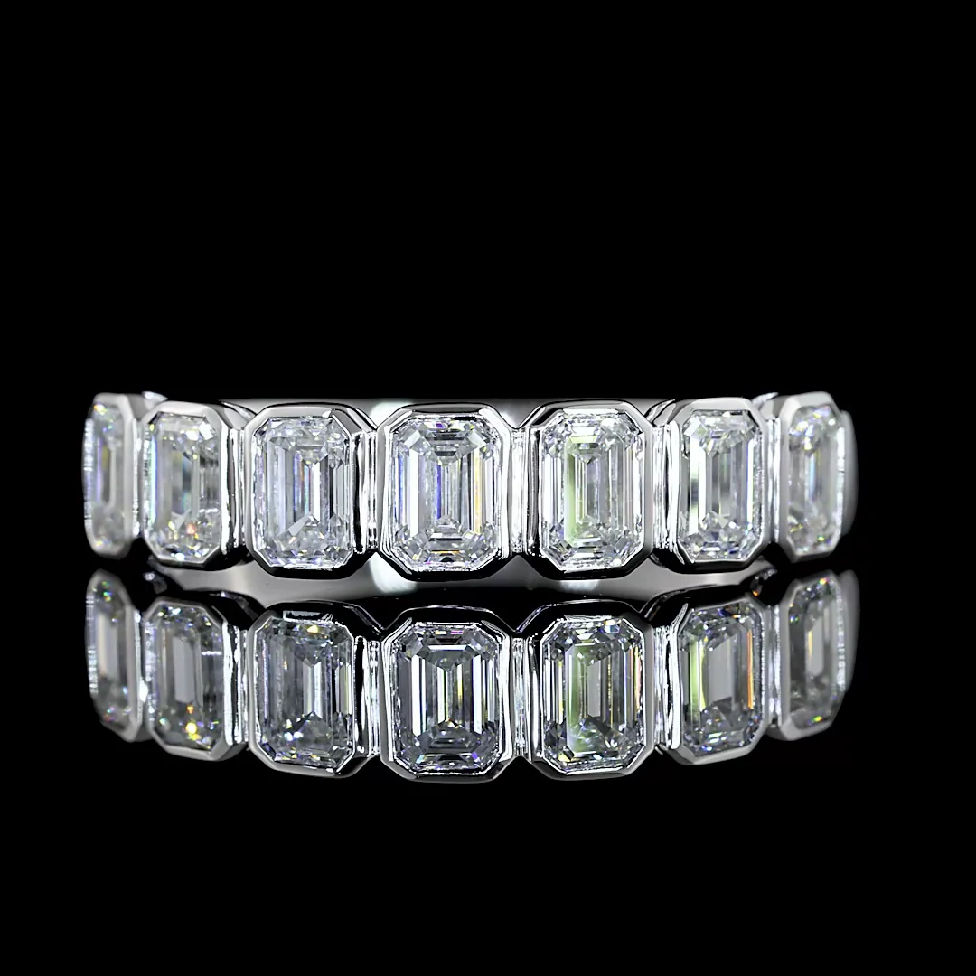 0.99 Cts 14k White Gold Emerald Shape 7 Stones Eternity Band - Video