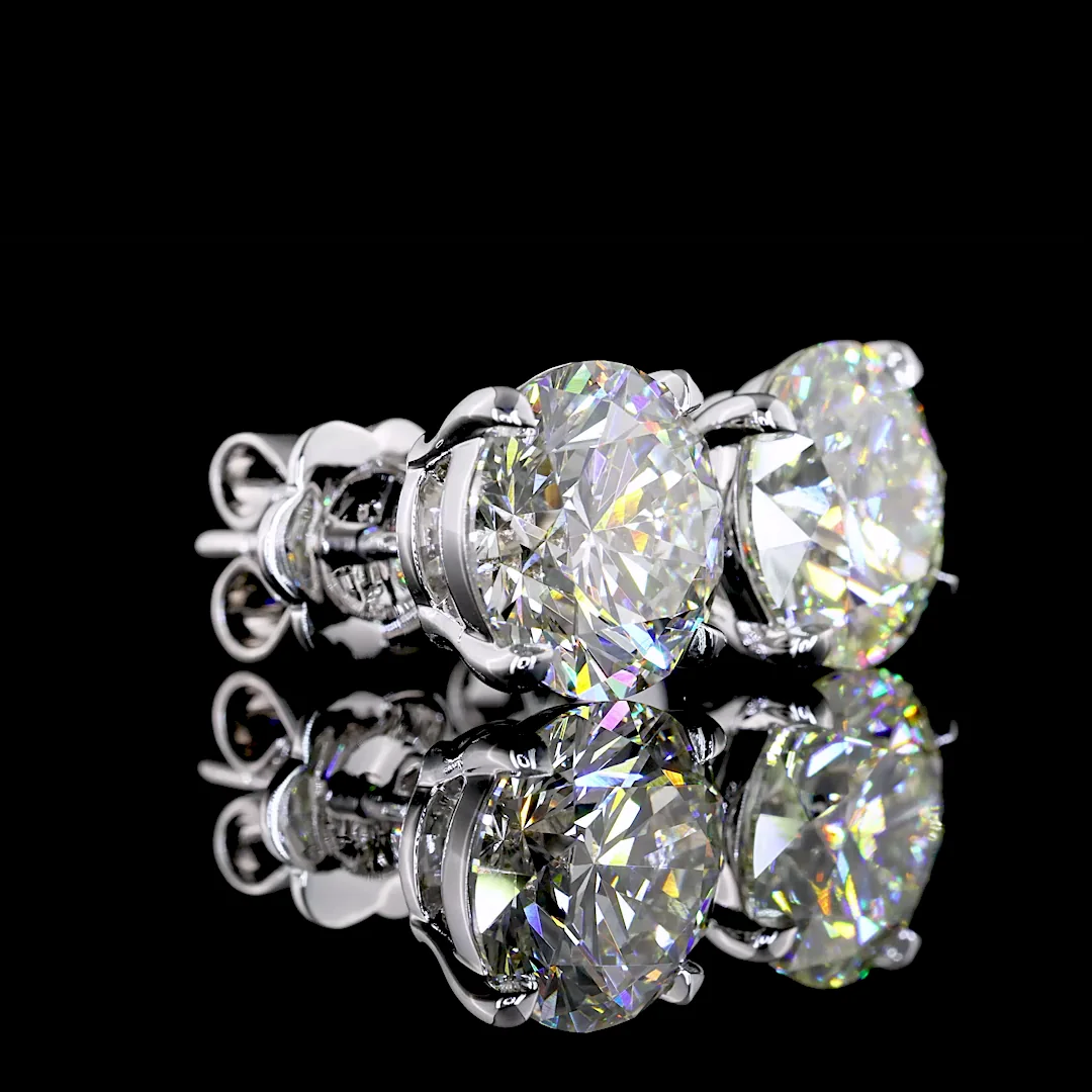 0.74 Cts 14k White Gold Round Shape Studs Earring - Video