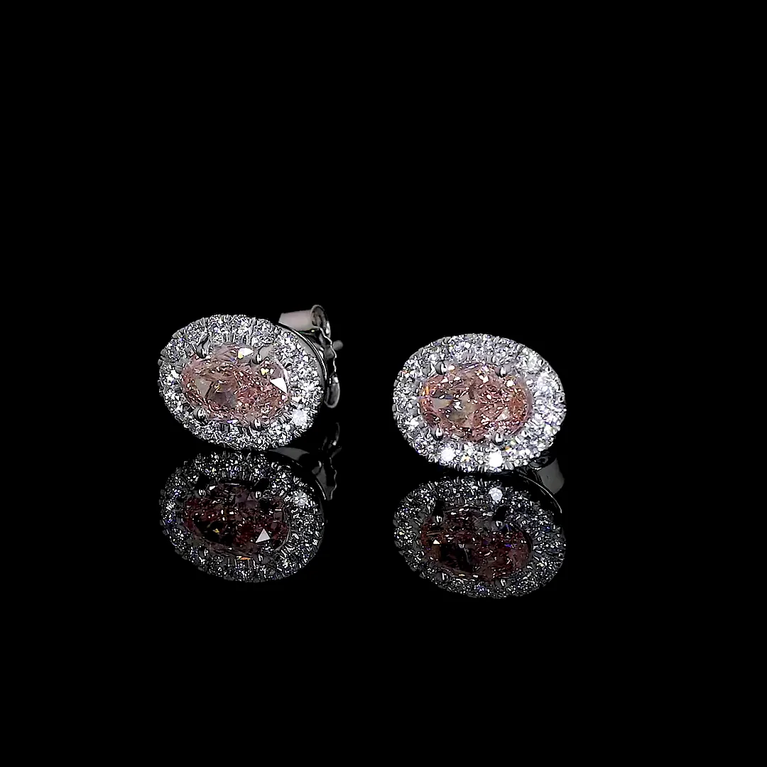 0.86 Cts 14k White Gold Oval Shape Halo Studs Earring - Video