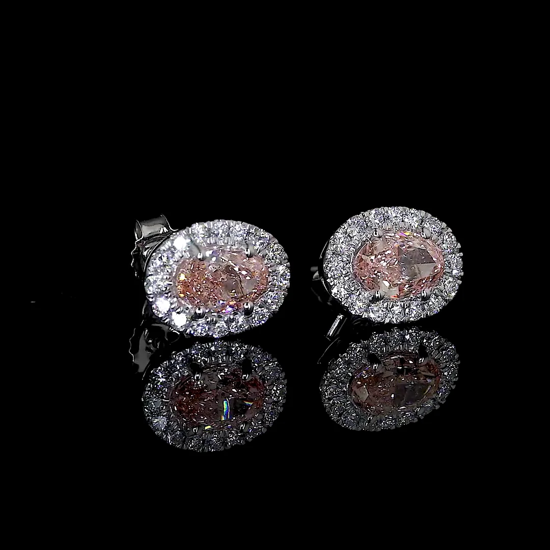 1.06 Cts 14k White Gold Oval Shape Halo Studs Earring - Video