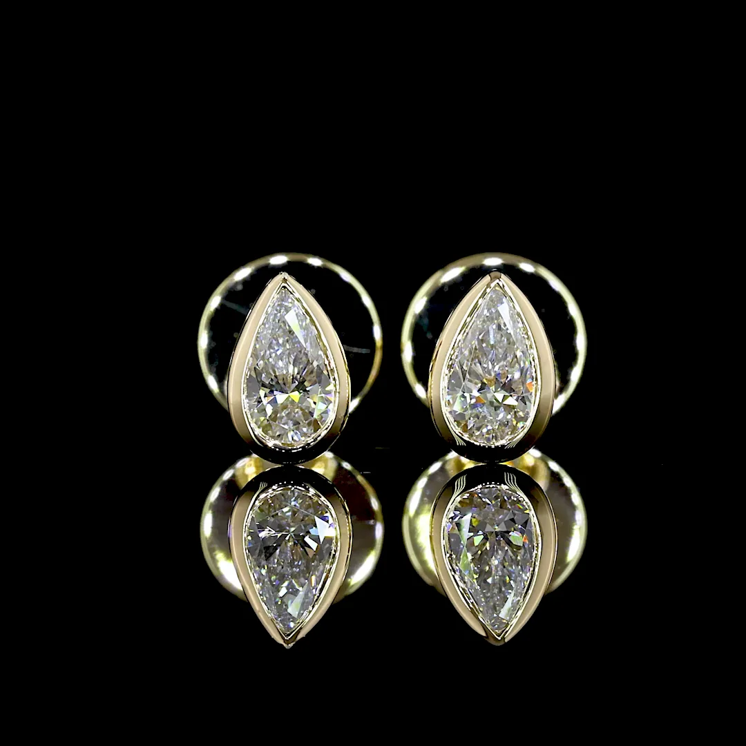 0.3 Cts 14k Yellow Gold Pear Shape Studs Earring
