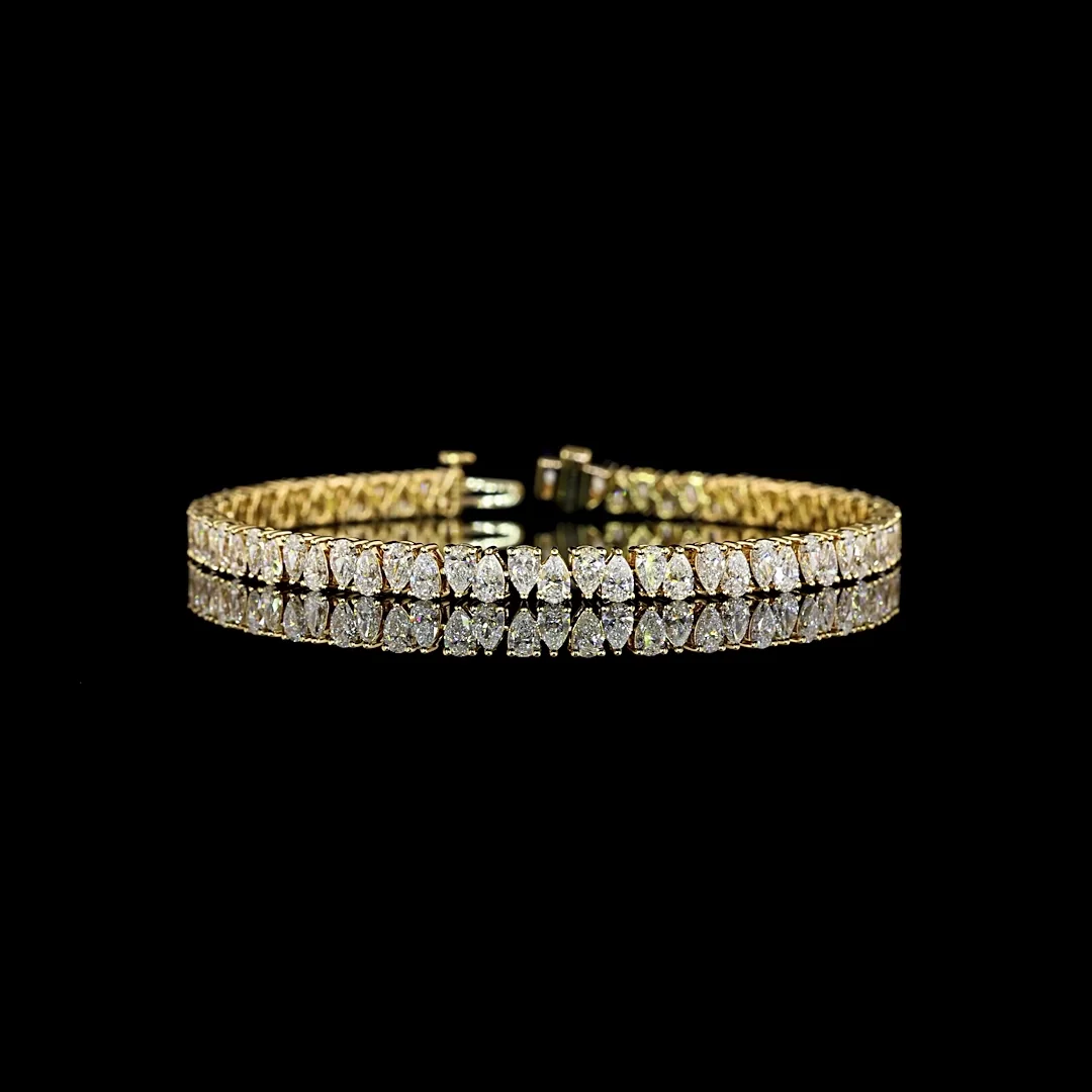 6.89 Cts 14k Yellow Gold Pear Shape Tennis Bracelet
