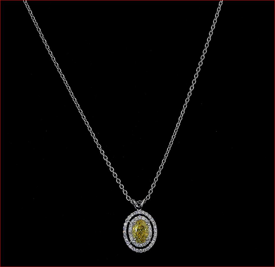 0.89 Cts 14k White Gold Oval Shape Double Halo Pendant