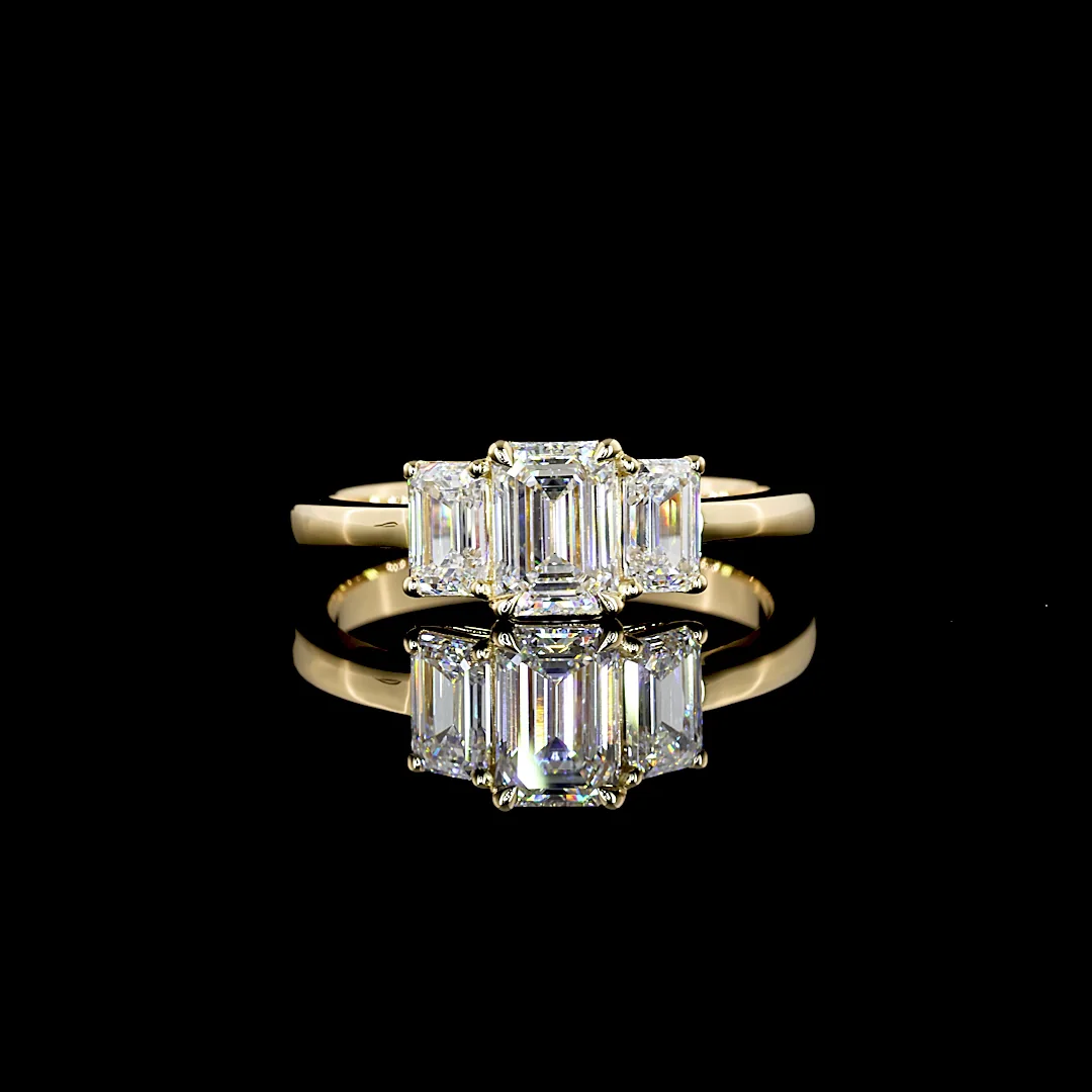 1.4 Cts 14k Yellow Gold Emerald Shape 3 Stones Ring